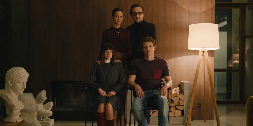 A family poses for a portrait in the film Family Therapy