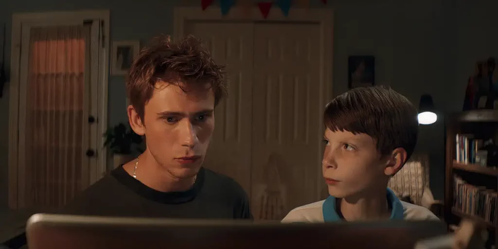 Two boys stand next to each other in the film Griffin in Summer