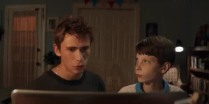 Two boys stand next to each other in the film Griffin in Summer