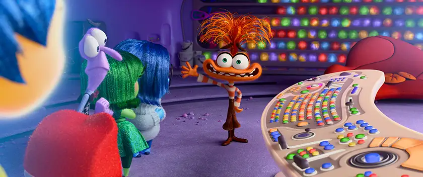 Anxiety waves at the other emotions in a still from the 2024 Disney and Pixar movie Inside Out 2