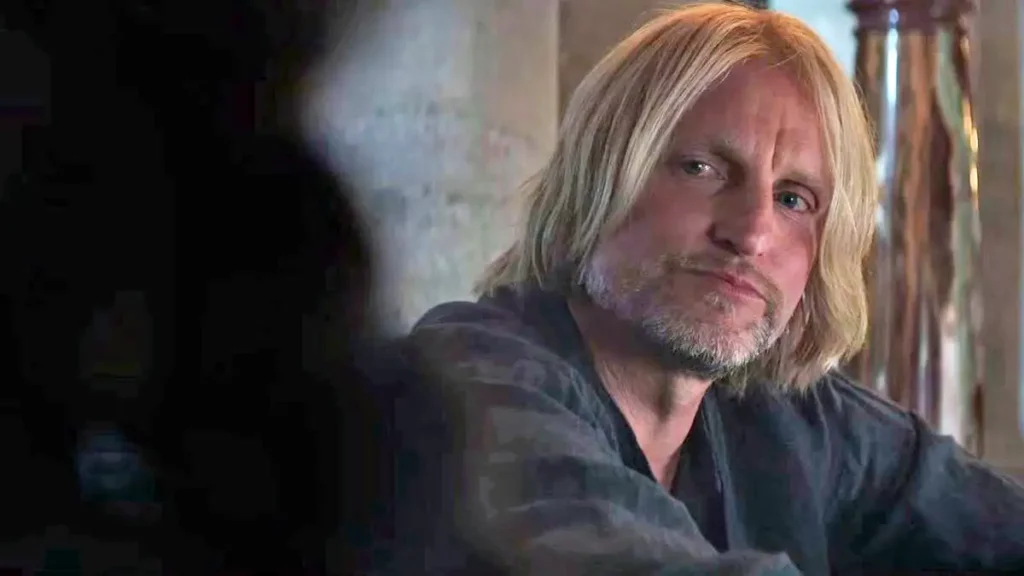 Haymitch Abernathy looks at someone. From everything we know about the Hunger Games movie, he will be the protagonist of Sunrise on the Reaping