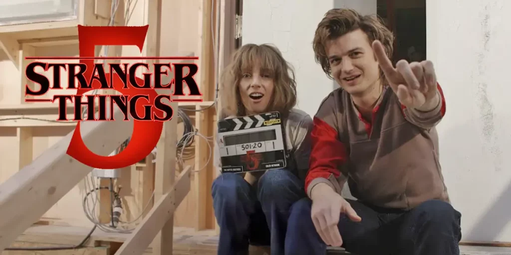 Two characters from Stranger Things Season 5 hold a clapperbox and the official logo for the series