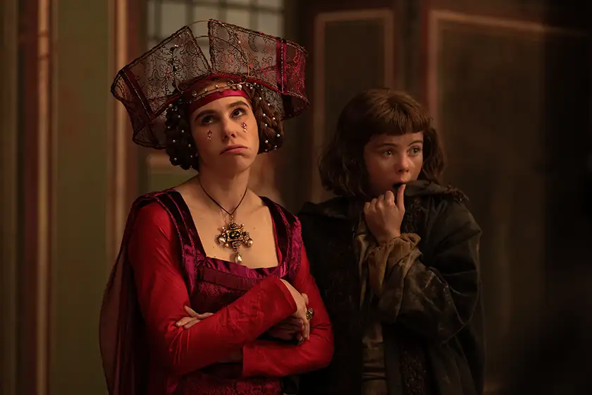 Zosia Mamet as Pampinea and Saoirse-Monica Jackson as Misia in Episode 102  of Netflix's The Decameron, featured in a Loud and Clear article about what to expect from the series