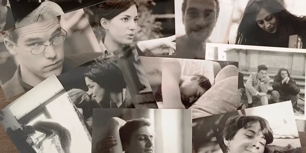 Many black and white photographs of people in a promotional still from the film Fragments of a Life Loved