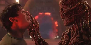 Vecna touches Will's face in a still from Stranger Things Season 5 featured in an article with everything we know about it