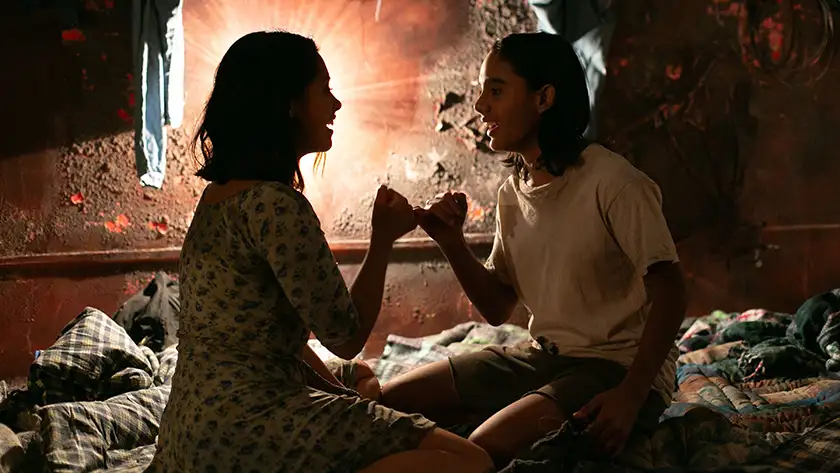 Renata Vaca as Elena and Ari Lopez as Jesús in City of Dreams