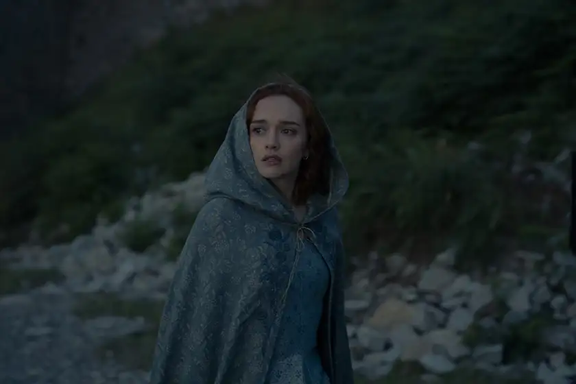 A red haired woman wears a shawl outdoors in Season 2 Episode 8, the season 2 finale, of House of the Dragon