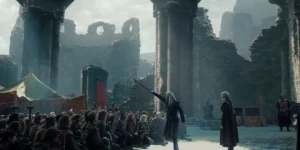 A man raises a sword to a crowd in Season 2 Episode 8, the season 2 finale, of House of the Dragon