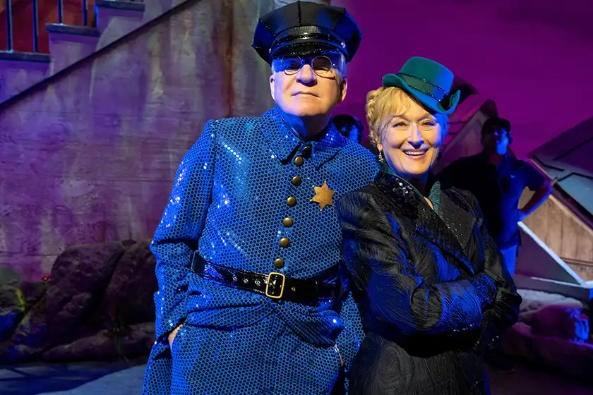 Steve Martin and Meryl Streep are dressed as a glamorous policeman and investigator in Only Murders In The Building Season 4