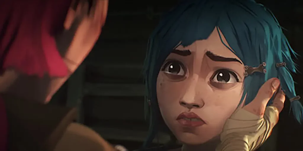 A blue-haired girl cries while staring at her sister in a still from the animated Netflix series Arcane Season 1