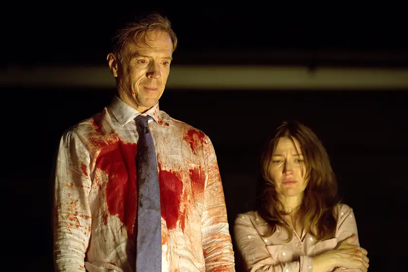 Damian Lewis as “Peter Radley” and Kelly Macdonald as “Helen Radley” in the comedy horror The Radleys