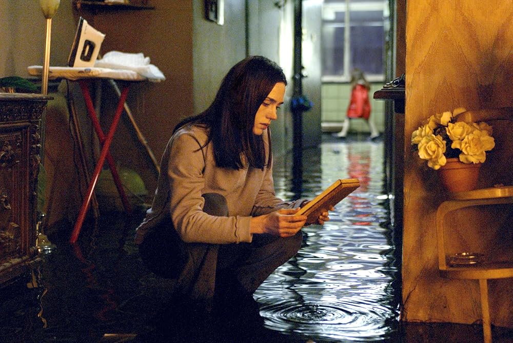 Jennifer Connelly and Perla Haney-Jardine in Dark Water (2005), featured in an article where we watched The Ring (2002) seven times in seven days