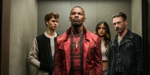 Four people stand in an elevator in Baby Driver