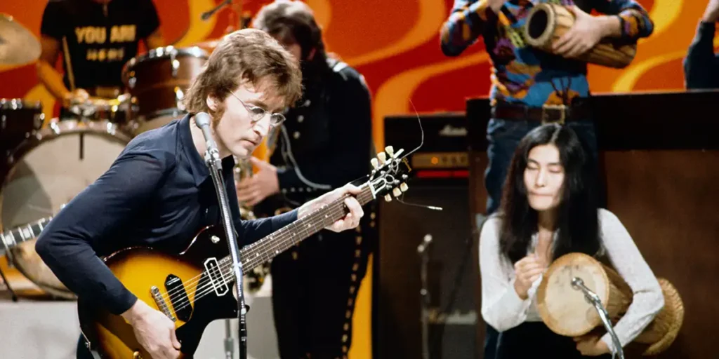 John Lennon and Yoko Ono perform in a still from the film Daytime Revolution