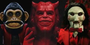 Posters for movies The Monkey, The Black Phone 2, and Saw XI