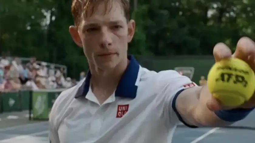 Mike Faist as Art wears a Uniqlo tennis t-shirt in Luca Guadagnino's Challengers, where the costume designer was Jonathan Anderson