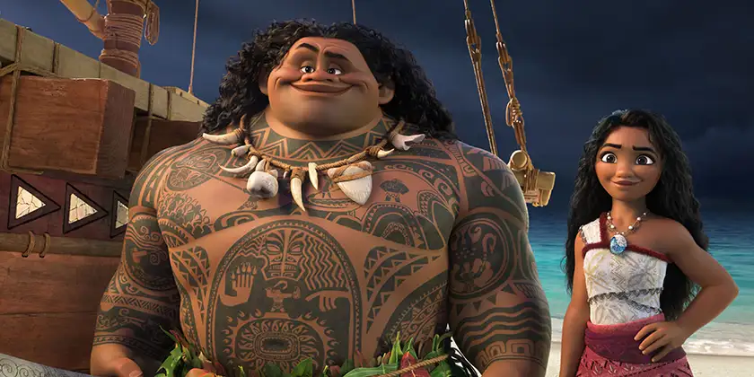 Moana (voice of Auli‘i Cravalho) and Maui (voice of Dwayne Johnson) stand by a ship on the beach in Moana 2