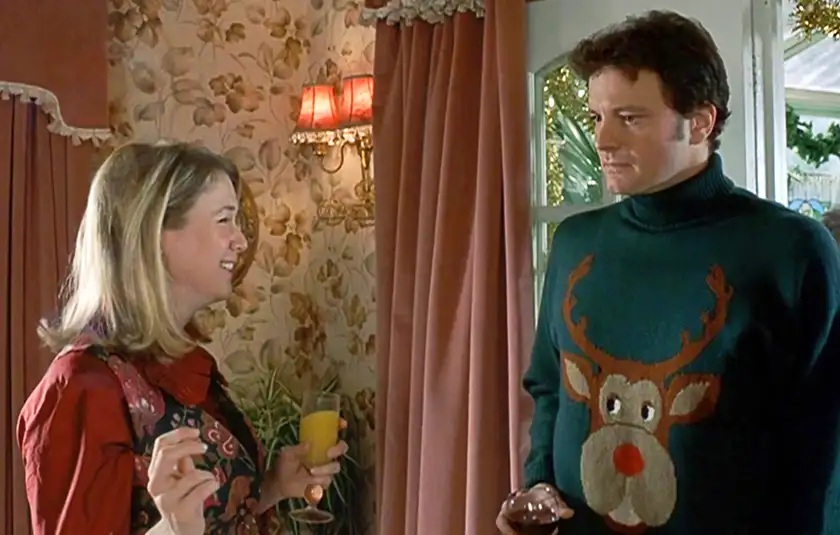 Renée Zellweger and Colin Firth wear Christmas sweaters in Bridget Jones’s Diary, one of the Bridget Jones Movies Ranked from Worst to Best in this article