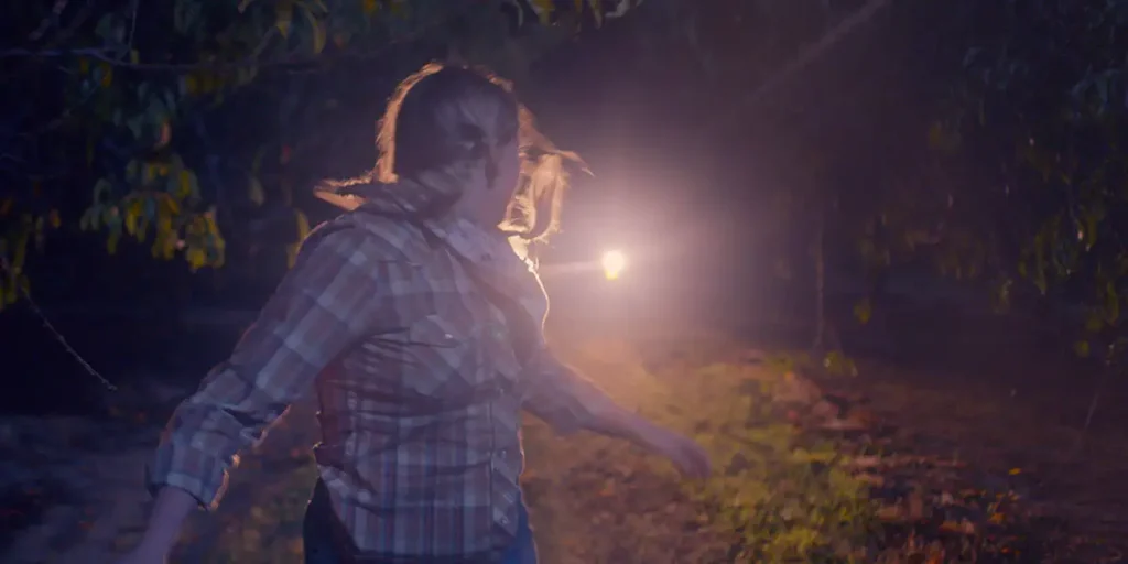 Madison Wolfe runs from a van at night in The Man in the White Van