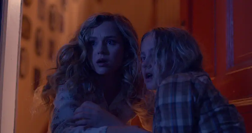 Madison Wolfe and Brec Bassinger in The Man in the White Van