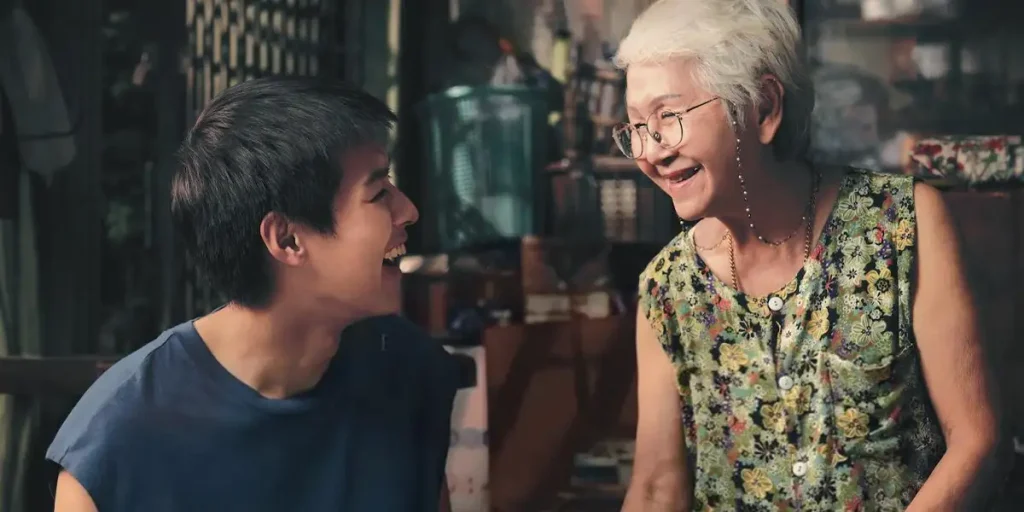 Putthipong Assaratanakul and Usha Seamkhum in How to Make Millions Before Grandma Dies