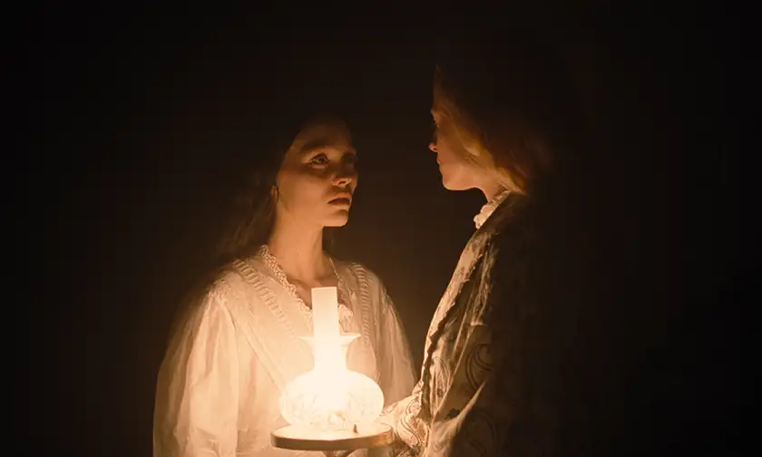 Lily-Rose Depp stars as Ellen Hutter and Emma Corrin as Anna Harding in director Robert Eggers’ Nosferatu (2024)