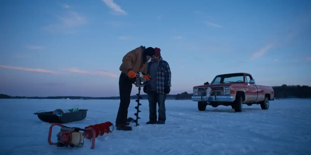 Ritchie Gordon and David Ezekiel Duran drill into the snow in the short film “February” (2024)