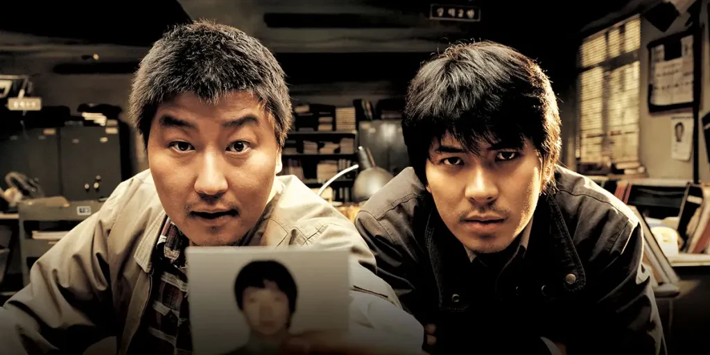 Song Kang Ho and Kim Sang-Kyung in Memories of Murder