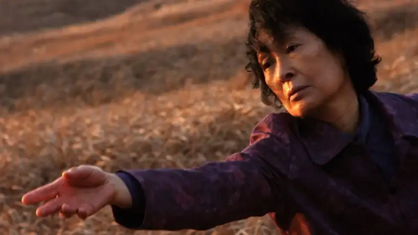 Kim Hye-ja stretches her hand out in Mother, one of all the Bong Joon-ho movies ranked from worst to best in this list