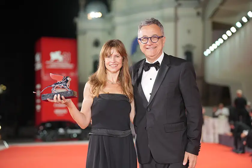 Director Maura Delpero and Paolo Del Brocco after winning the Grand Jury Prize for Vermiglio at the 2024 Venice Film Festival