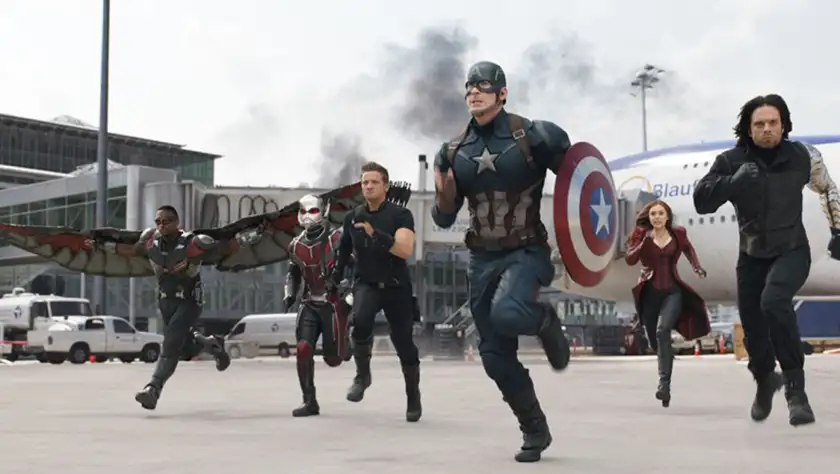 Steve Rogers and his team run away from a train preparing to fight in a scene from Captain America: Civil War, one of the reasons why the movie still holds up