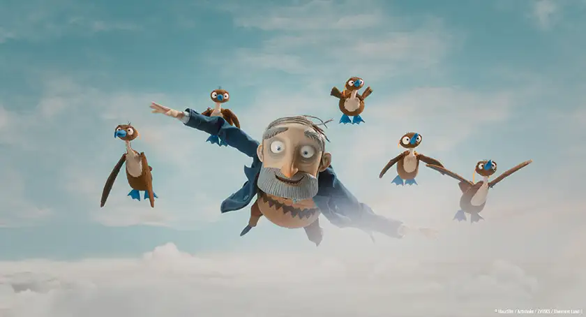 An old man flies with a flock of cormorant birds in the stop-motion animated movie Tales From the Magic Garden