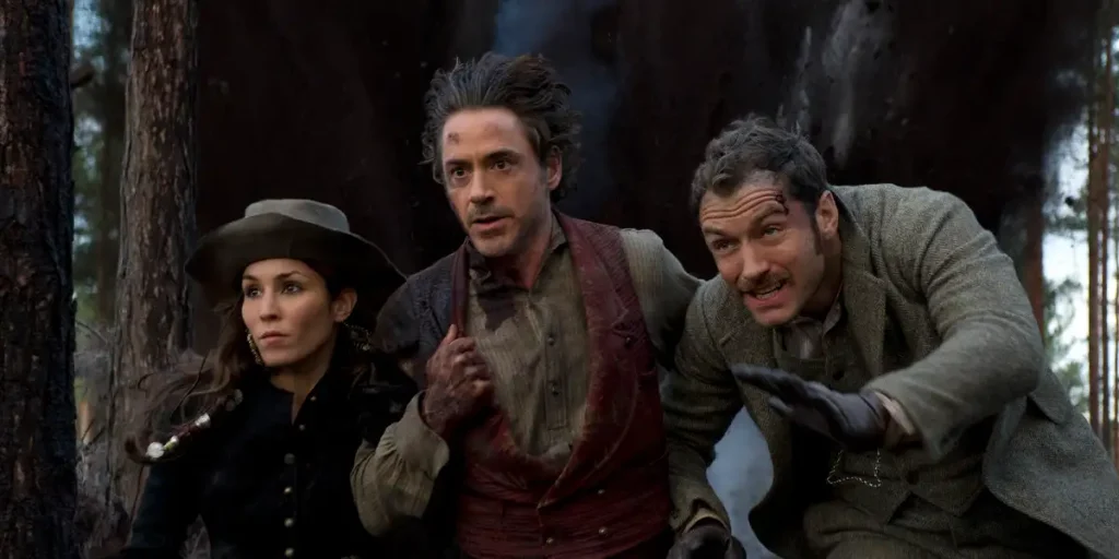 Noomi Rapace, Jude Law and Robert Downey Jr. in Sherlock Holmes: A Game of Shadows