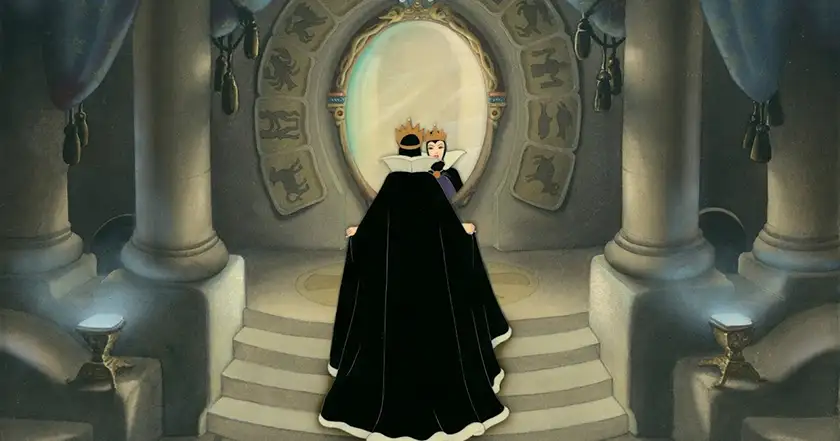 The Evil Queen chants in front of her magic mirror in Snow White and the Seven Dwarfs (1937)