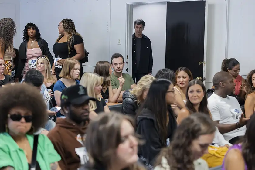 Nathan Fielder enters a crowded room in Season 2 of The Rehearsal