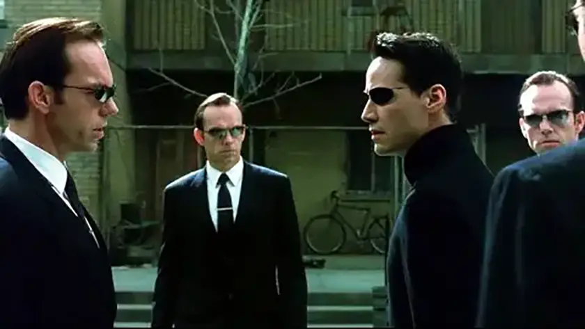 Hugo Weaving replicates as Agent Smith and faces Keanu Reeves as Neo in The Matrix Reloaded