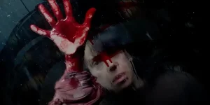 Sally Hawkins stretches out a bloody hand in the movie Bring Her Back
