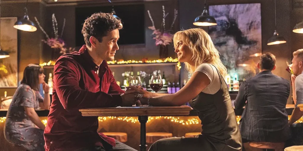 Conrad and Ruby Sunday sit down at a table in Season 15 (also known as Season 2) Episode 4 of Doctor Who (2025), named "Lucky Day"