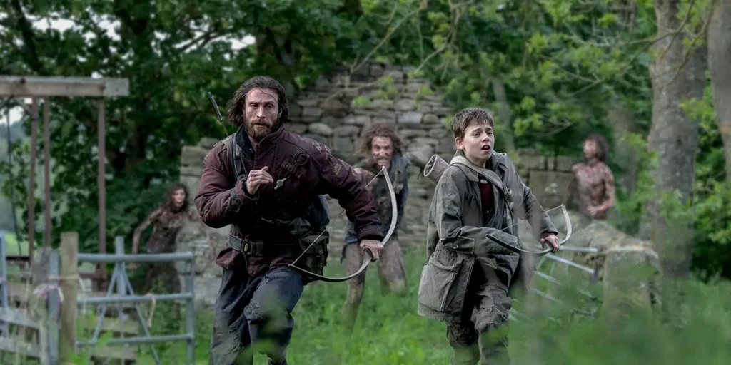 Jamie (Aaron Taylor-Johnson) and his son Spike (Alfie Williams) in "28 Years Later"