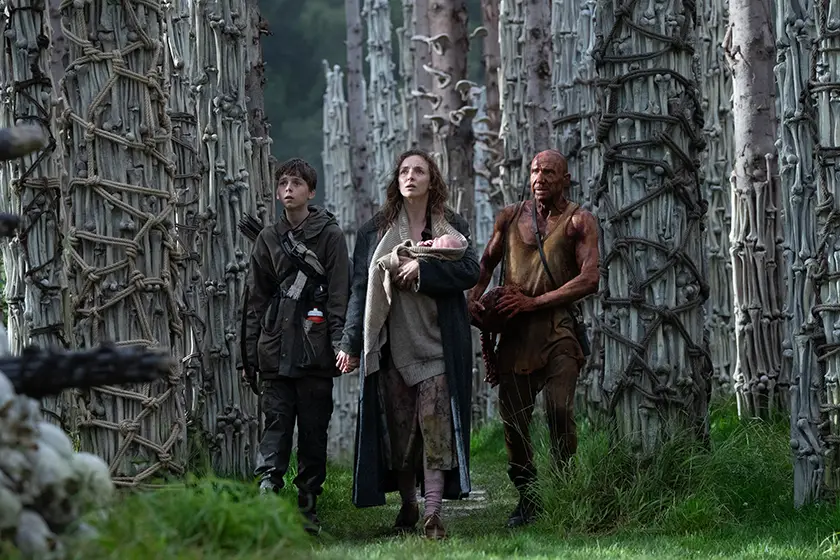 Spike (Alfie Williams), Isla (Jodie Comer) and Dr. Kelson (Ralph Fiennes) in "28 Years Later"