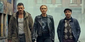 Bryce Dallas Howard as KAT, Orlando Bloom as MARLON, Nick Mohammed as HUGH in Deep Cover