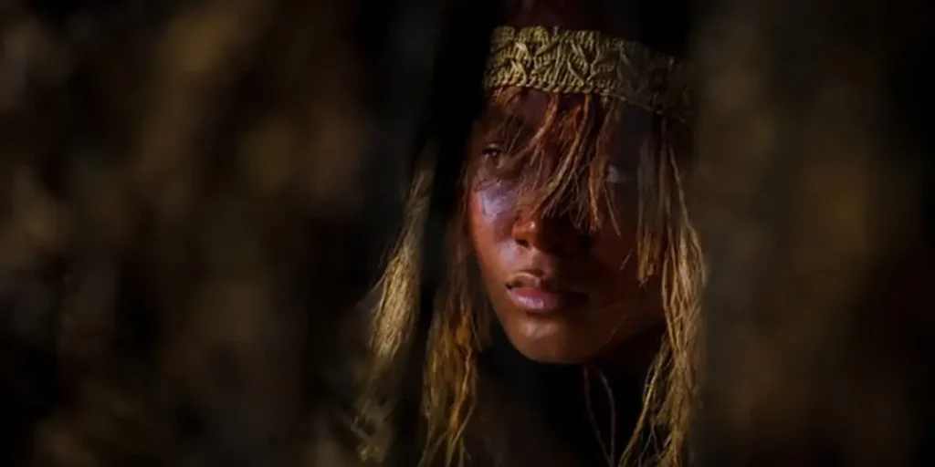 A young woman looks to her right in a still from the movie In the Fire of War (Ka Whawhai Tonu)