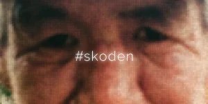 A man's eyes and the word #skoden in a still from the 2025 documentary #skoden