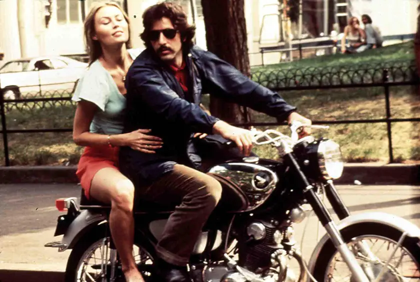 Al Pacino and Cornelia Sharpe on a motorbike in Serpico (1973)