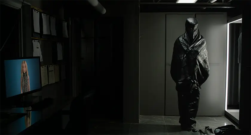 A burial shroud and a screen with an avatar of Karch's wife in a still from the film The Shrouds, where David Cronenberg explores death and mortality