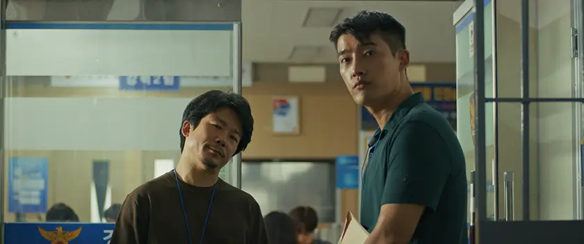 Two boys in a still from the film The Woman (더 우먼)