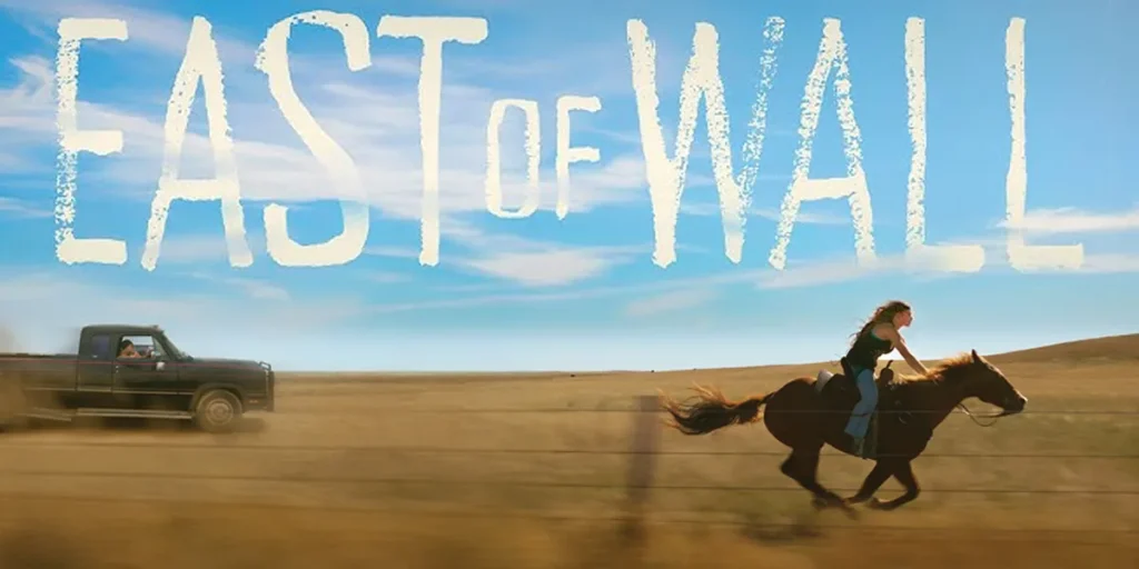 Jennifer Ehle rides a horse in a still from the film in East of Wall