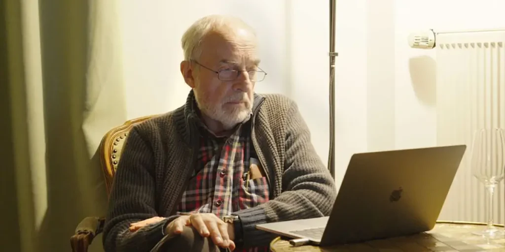 Dr Johann Spittler uses his computer in a still from Green Light