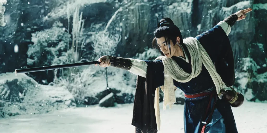 A young man yields a sword in a still from the film Invincible Swordsman