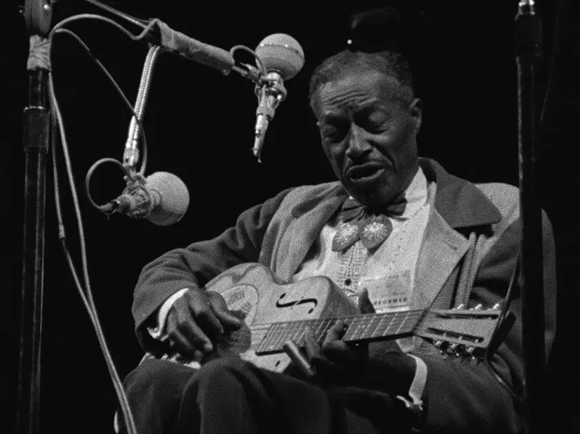 Son House in a still from Newport & the Great Folk Dream, whose director, Robert Gordon, we interview
